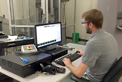 student working in lab on computer